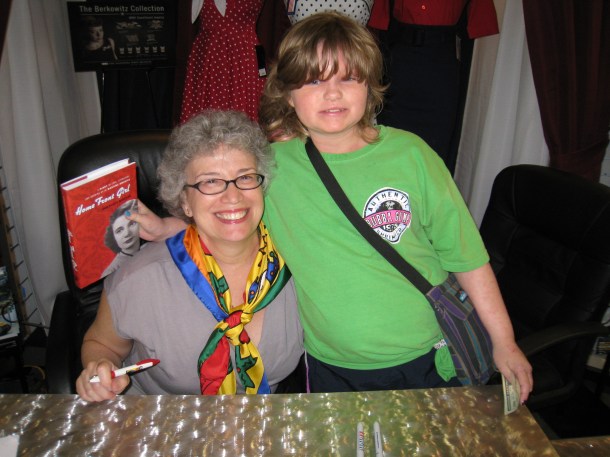 With a young customer and reader