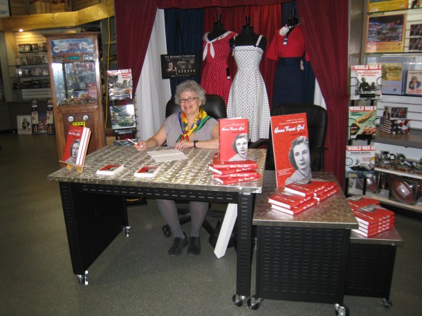 In the National World War II Museum Gift Shop, preparing for the signing