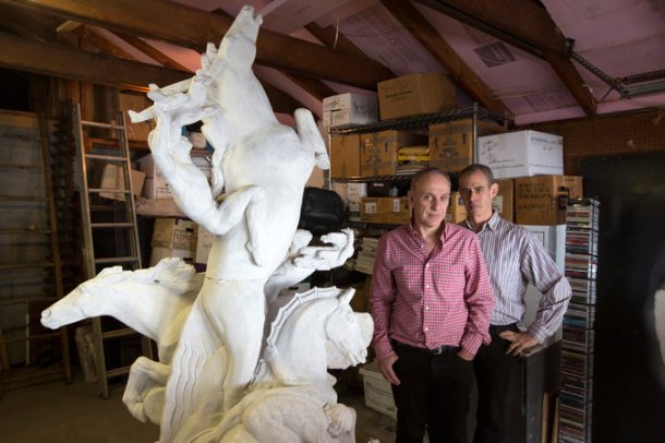 Dr. Roy Goldberg at left and Keith Sherman at the right next to their plaster model of a statue from the 1939 World’s Fair in Queens. Credit James Estrin/The New York Times .